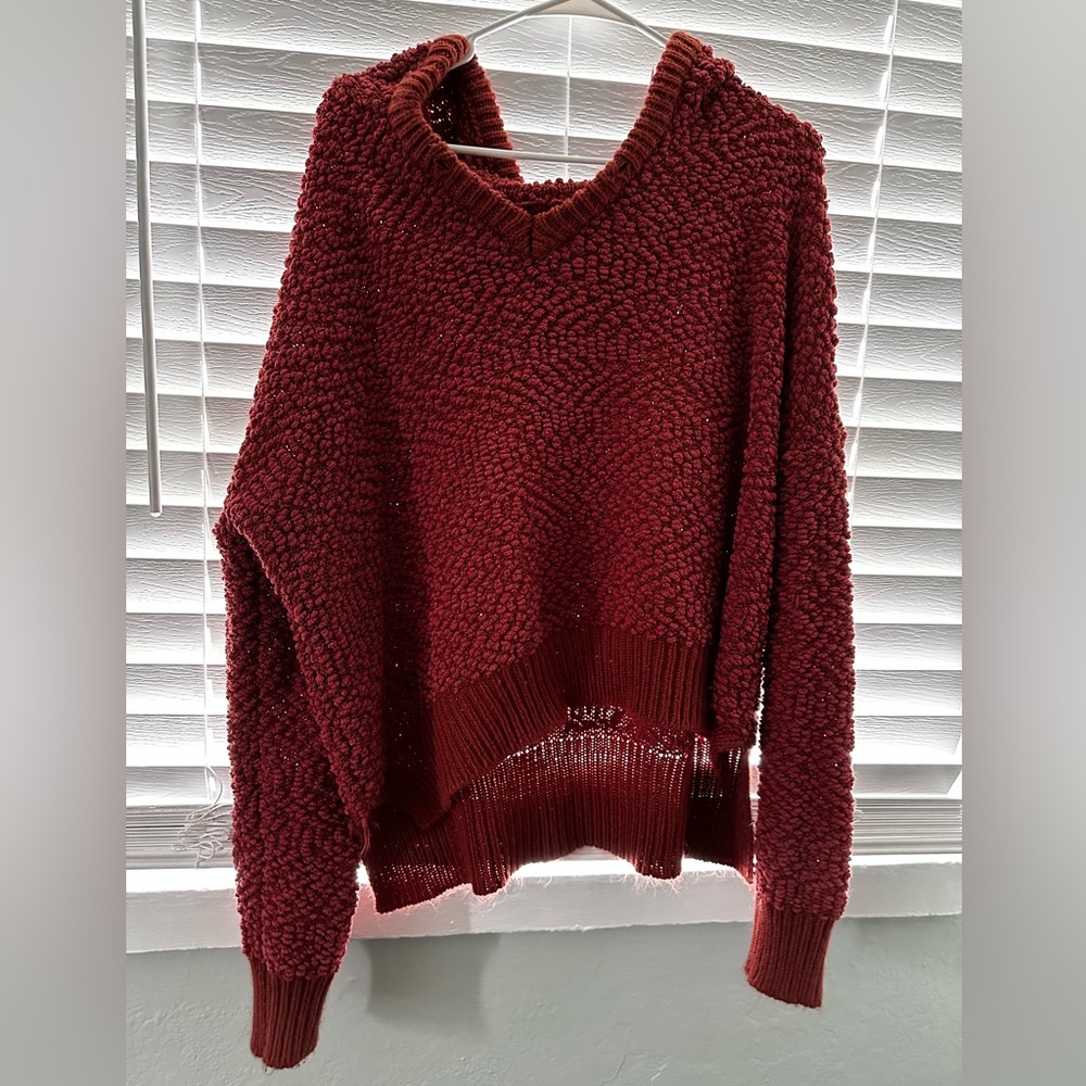 Burnt orange sweater size large.